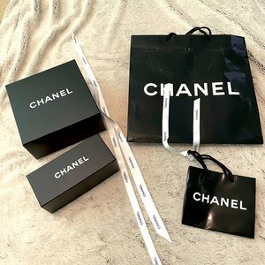 Bundle of authentic Chanel boxes, bags & ribbons